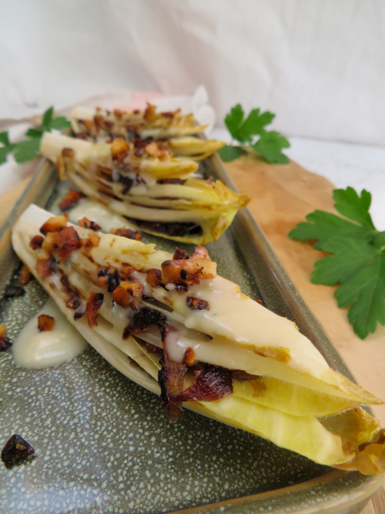 Grilled endive with gorgonzola and caramelized onions