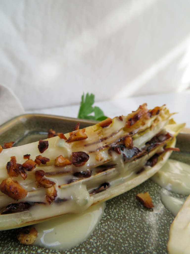 Grilled endive with gorgonzola and caramelized onions