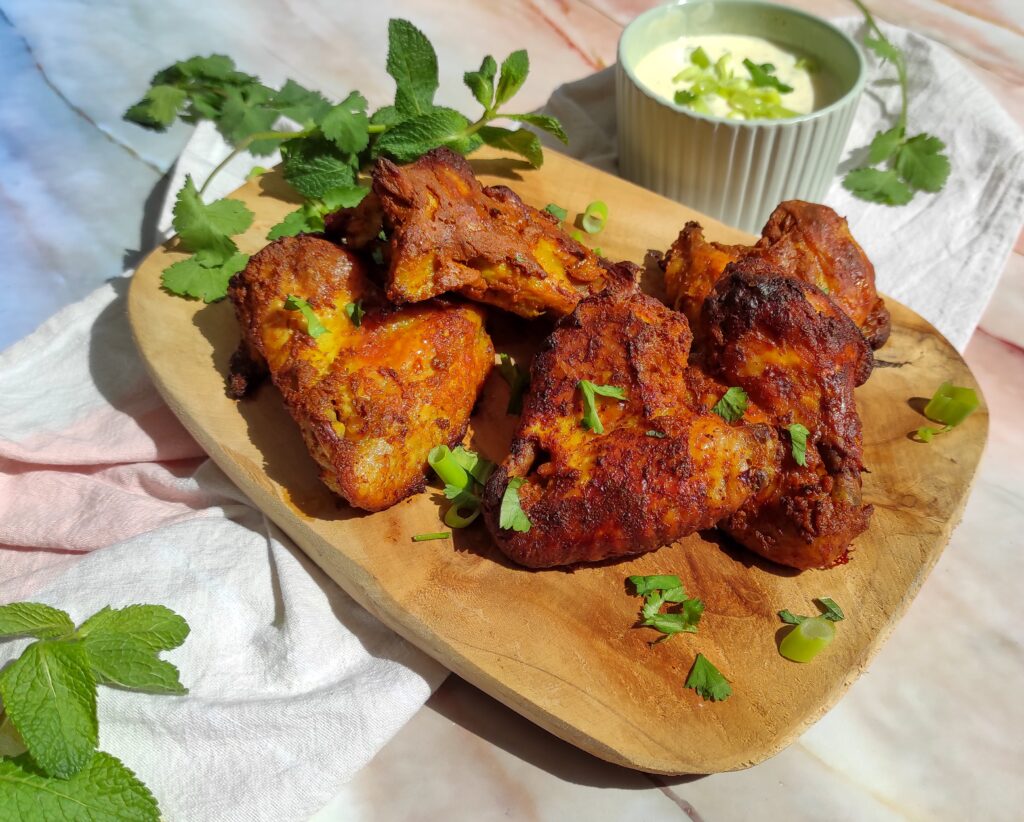 chicken tikka masala wings slow cooker-rootsandcoook