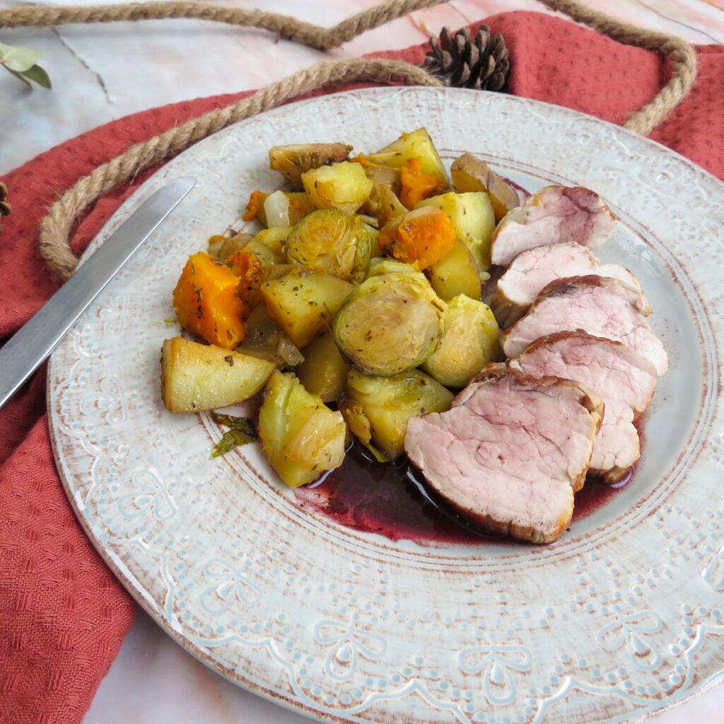 slow cooker pork tenderloin with port wine sauce and roasted vegetables