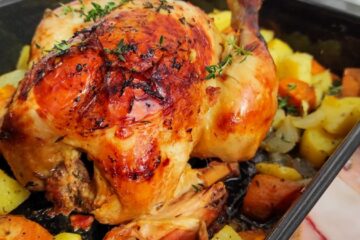 orange and thyme roasted chicken on the slow cooker with roasted vegetables